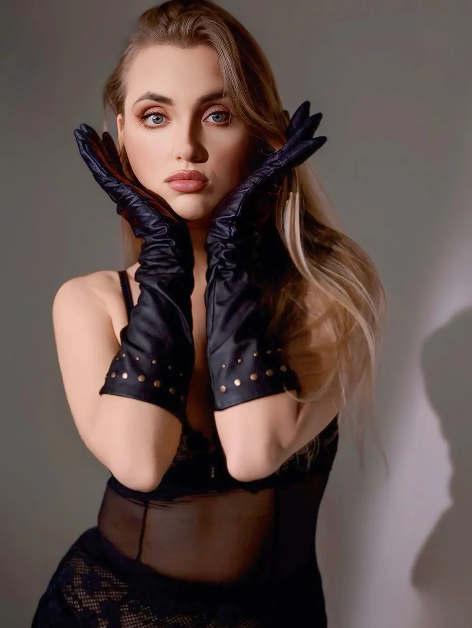 Paula Maria Rosalia in black gloves for a dramatic editorial portrait