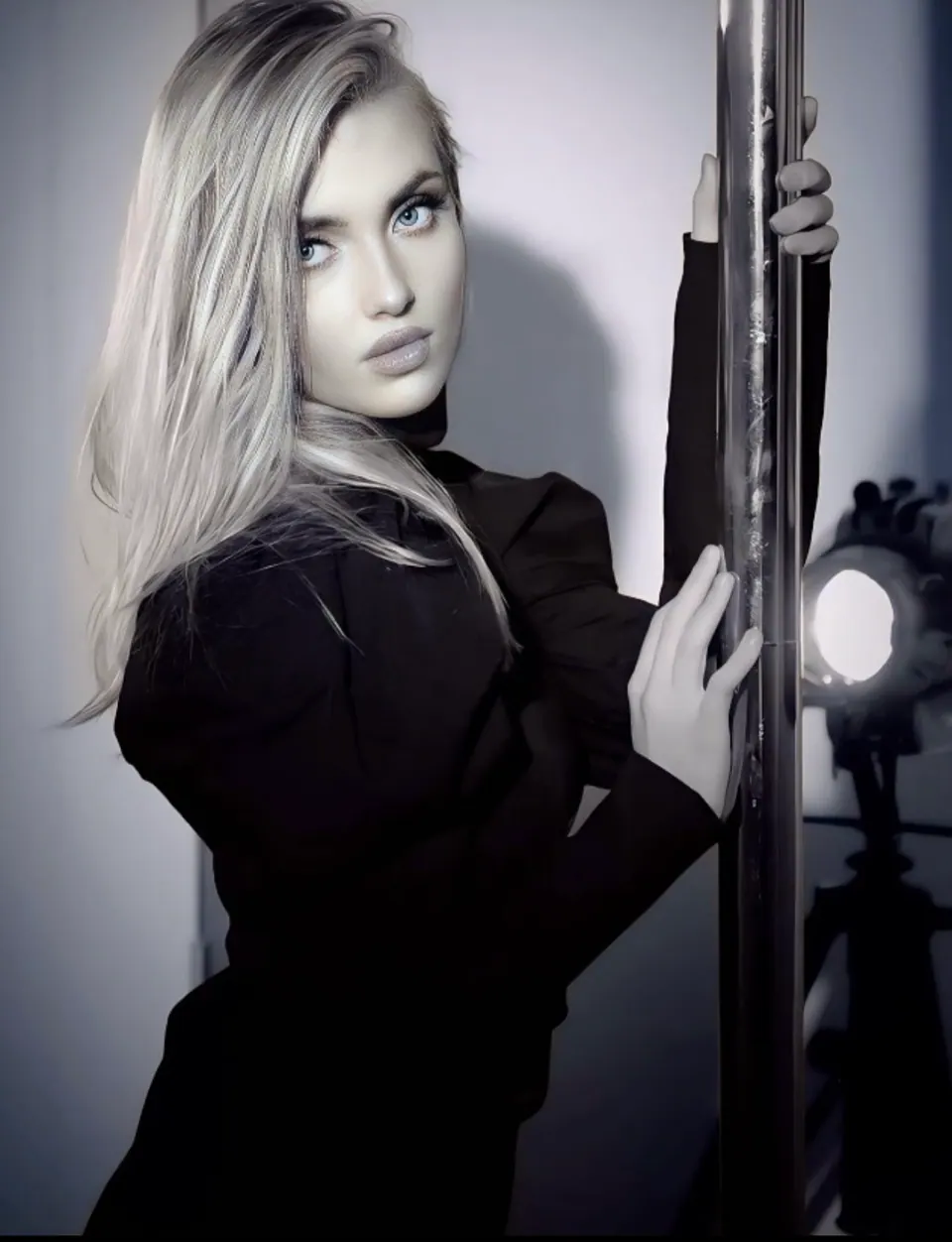 Paula Maria Rosalia in black studio styling with dramatic light