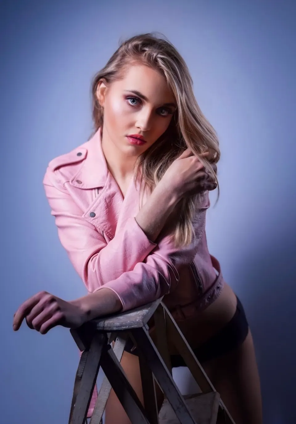 Paula Maria Rosalia in a pink jacket studio portrait